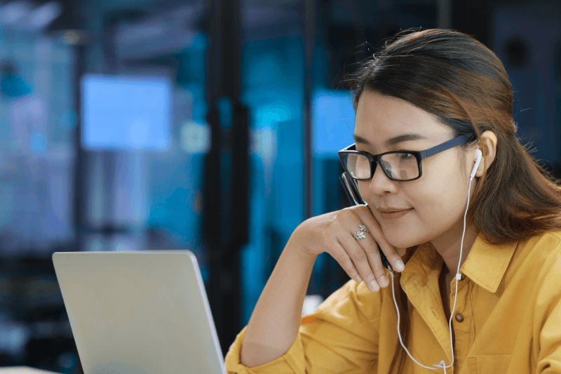 Student learning digital marketing online in Telugu using laptop and AI tools in a focused learning environment